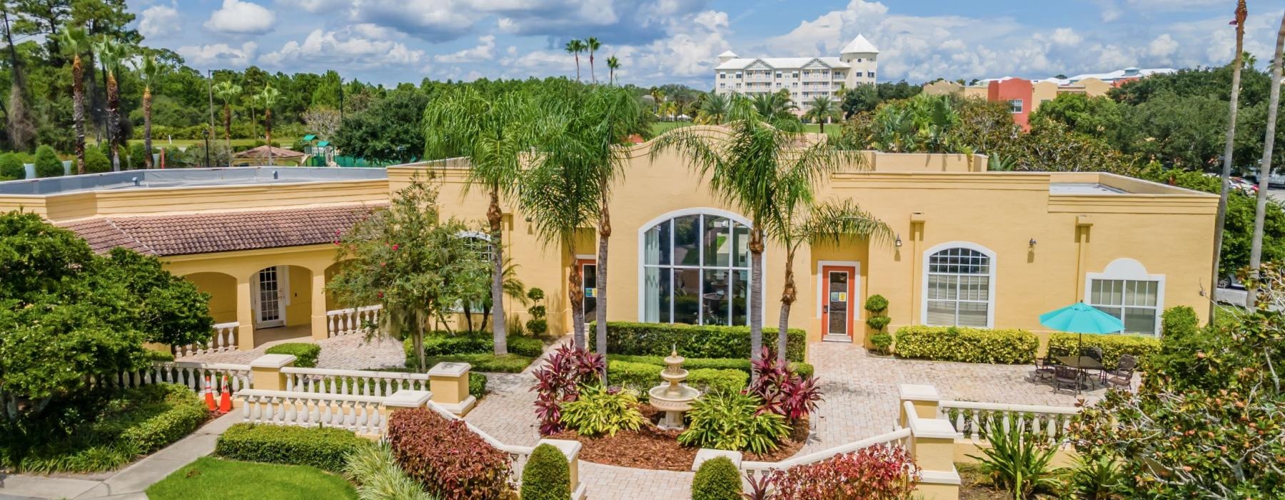 a building with a large front yard